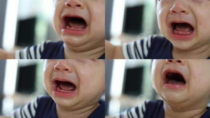小男婴含泪哭泣，不开心的感觉，慢动作镜头