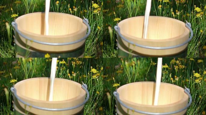 将牛奶倒入木桶的视频-真正的慢动作