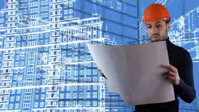 一名戴着安全头盔的男子阅读了spinnig建筑方案的蓝图背景