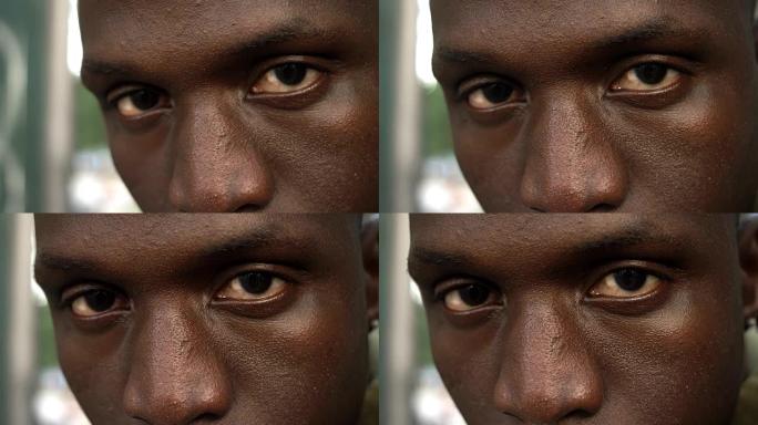 强壮而愤怒的非洲男人的眼睛-宏观