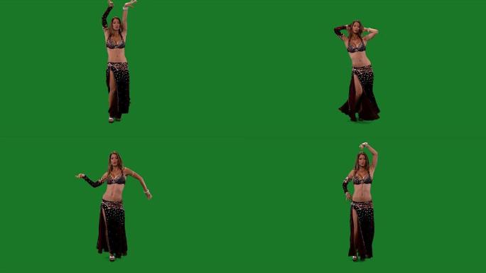 舞者。肚皮舞。肚皮舞者跳舞。绿色的屏幕。勃艮第性感的裙子