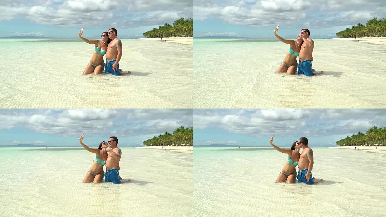 一个男人和一个女人在海上使selfi