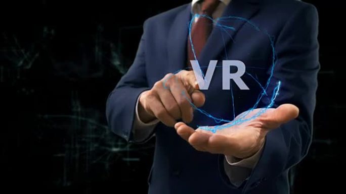 商人在他的手上展示概念全息图VR
