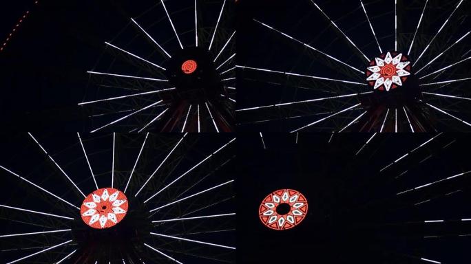 游乐园中的摩天轮，慢动作之夜拍摄发光景点的视频