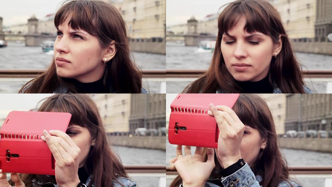女孩从电话中拍照，在圣彼得堡的船上航行