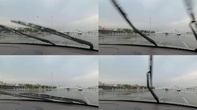 雨水、汽车挡风玻璃和雨刷