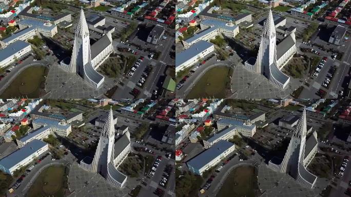 Hallgrimskirkja教堂概述冰岛雷克雅未克现代建筑。航拍录像。从顶部到镇上。空中无人机视频