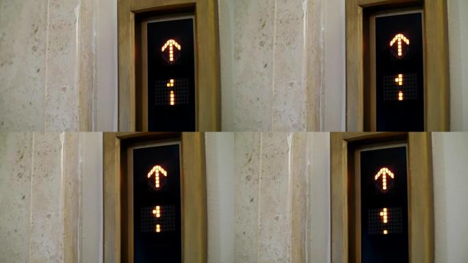 显示屏上的箭头亮起。显示屏显示电梯在哪里移动，向上或向下，现在位于哪个楼层，关闭