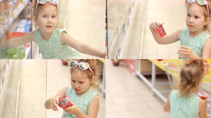 商店里的小女孩打开冰箱门，买婴儿食品。在超市购物