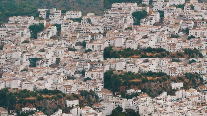许多白色的房子高高在山上，全景，美丽的白色村庄的安达卢西亚在西班牙。