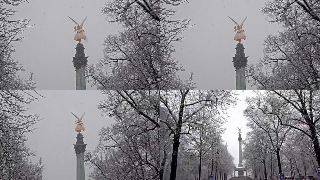 雪景期间，德国慕尼黑弗里登森格尔纪念碑顶部的和平天使