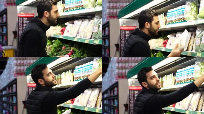 男子在超市选择产品