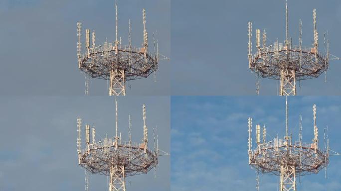 延时: 蓝天背景上结冰的电信塔