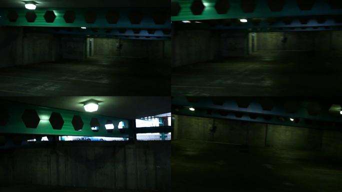 地下室令人毛骨悚然的空黑暗停车场的视点
