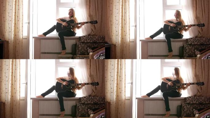 年轻少女在家弹吉他