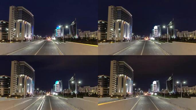 夜间城市交通库纳耶夫大道延时过度。哈萨克斯坦阿斯塔纳