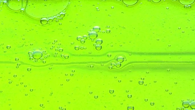水油泡泡背后的玻璃背景