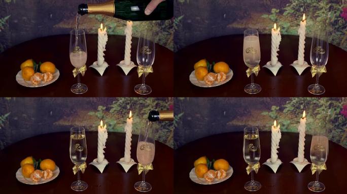 男子手持一瓶香槟葡萄酒，倒入玻璃杯中。结婚戒指和香槟杯，以及黑色背景上的装饰品。情人节。