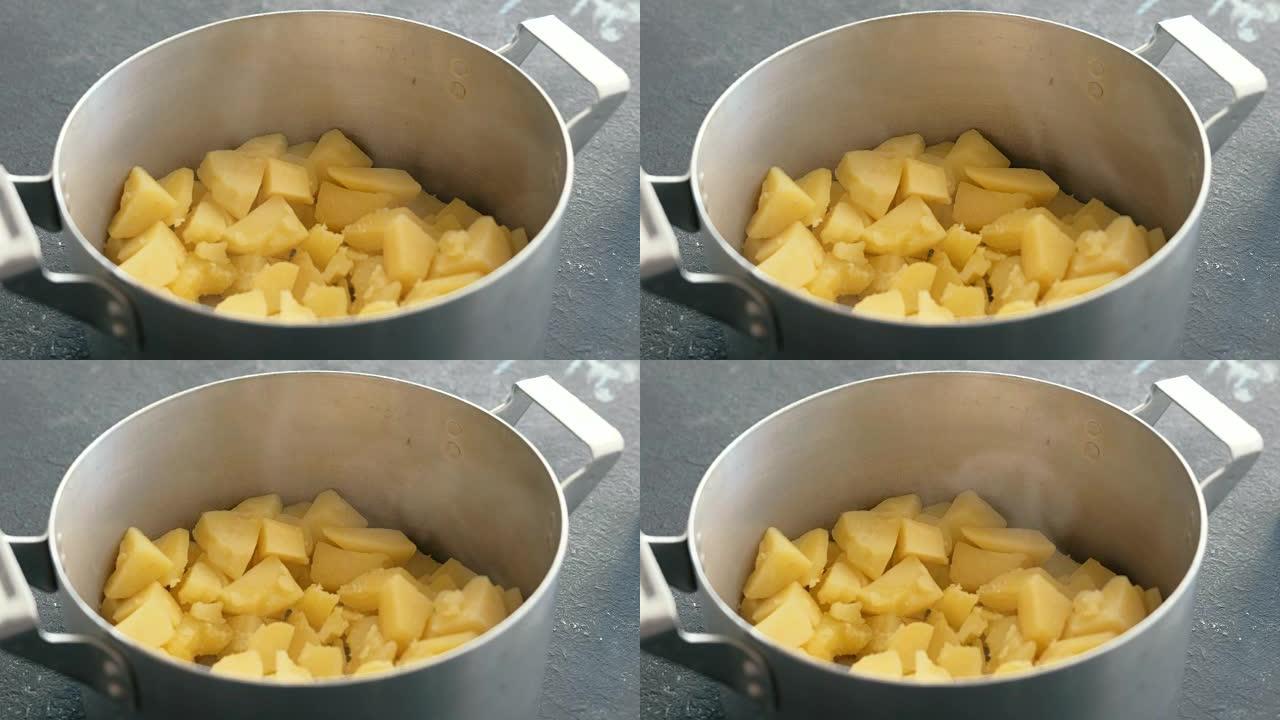 平底锅煮土豆的特写镜头。煮土豆泥。