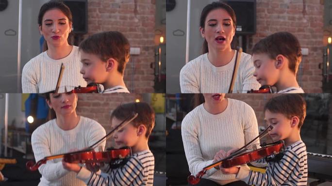 小男孩教小提琴