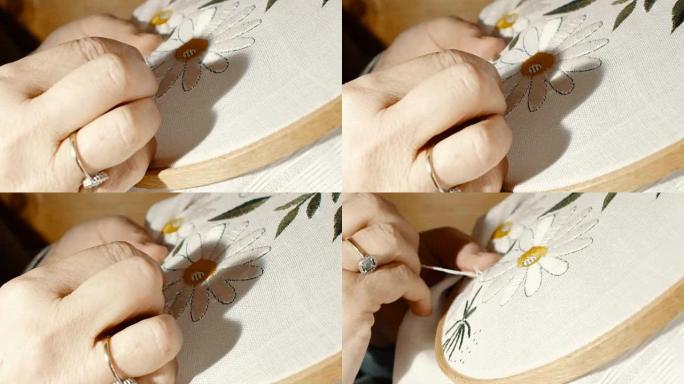用木架绣花编织花朵的近距离手