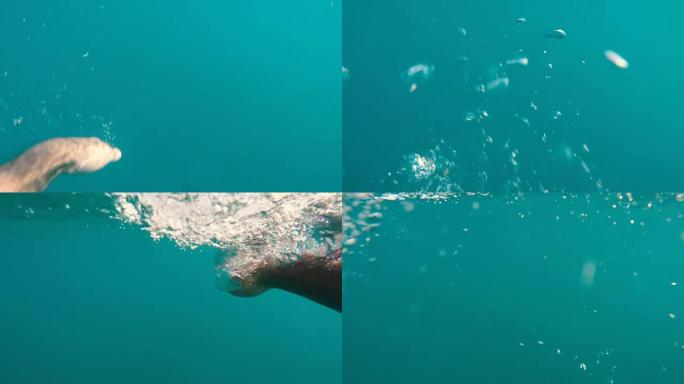 水下漂浮的人的手