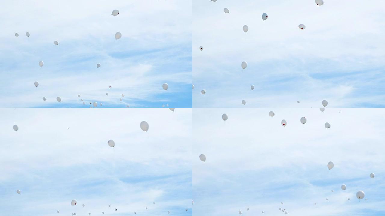 红心的白色气球飞向天空