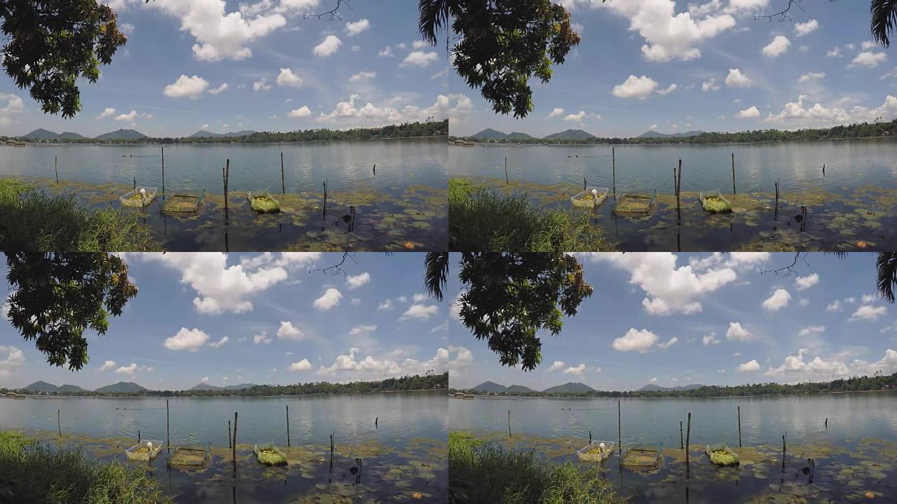 高山湖上的竹竿结构和木筏。跟踪镜头