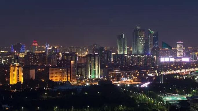 哈萨克斯坦阿斯塔纳的bayterek Timelapse城市中心和中央商务区的高架夜景