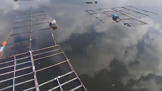 水产养殖养鱼维持拉古纳桑帕洛克湖小农村捕鱼社区的生计。无人机，航拍