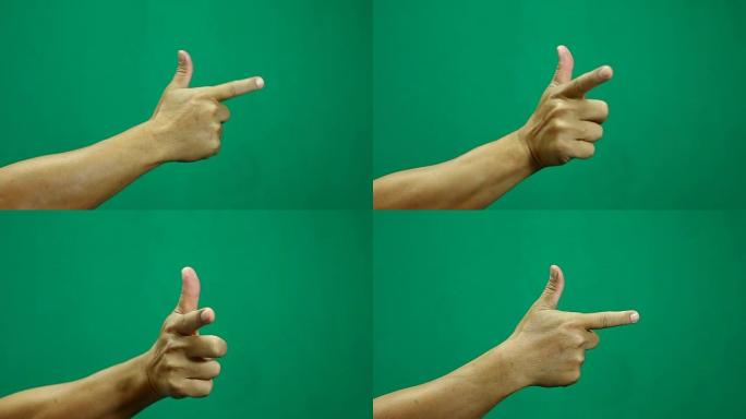 男子用绿色屏幕指着手指