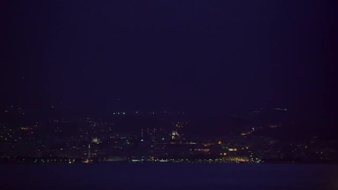 View from the sea and the villa at night in Italy