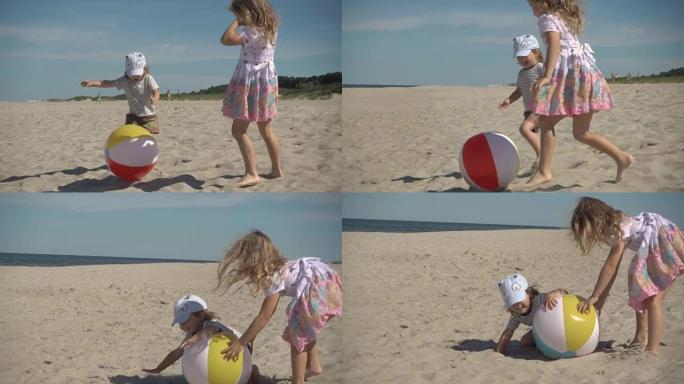 孩子们在沙滩上玩耍。家庭避暑海滩度假。慢动作。快乐的男孩和女孩在阳光明媚的夏日在海岸打球