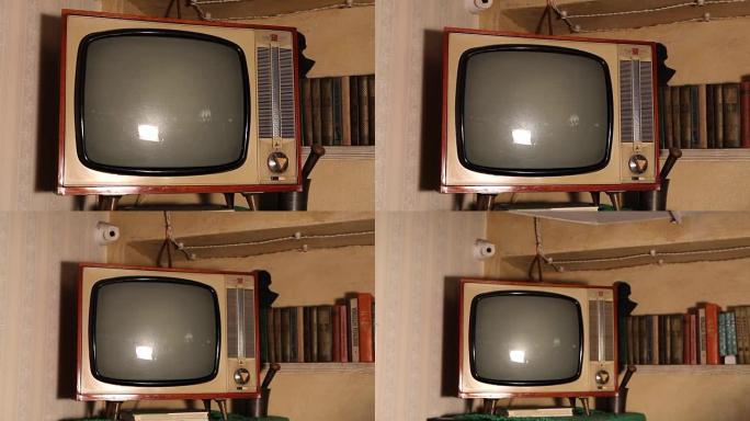 旧电视，旧室内的复古电视。老式电视屏幕上的真实静电