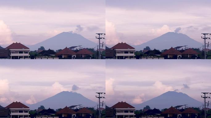 阿贡山从印度尼西亚巴厘岛的一座活火山喷出灰烬和烟雾
