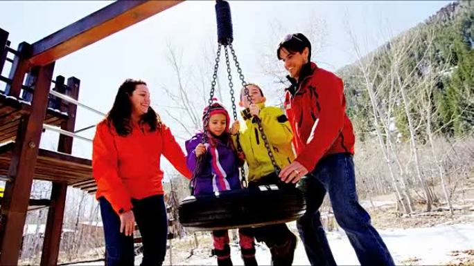 高加索父母幼儿户外趣味冬季游乐场