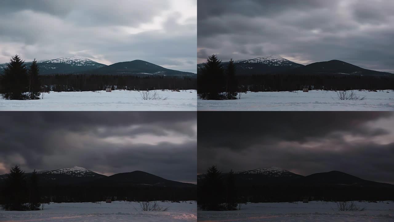 延时剪辑。喀尔巴阡山脉五彩缤纷的冬日日落。视频。初冬山区雪日落云滑雪。天然复合材料的优异循环