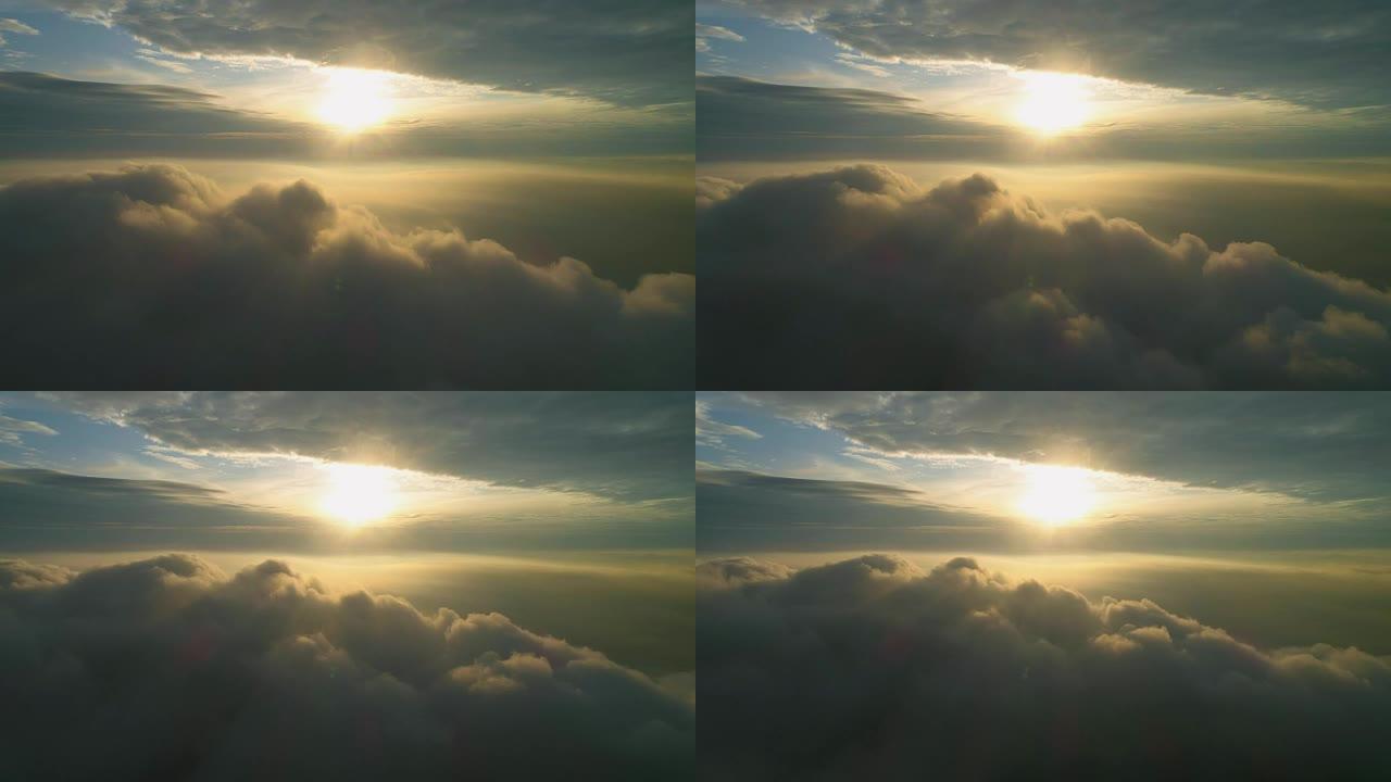 日出时飞过沉重的灰色黑色戏剧性云。空中延时运动。无人机过度。
