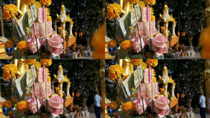 芭堤雅大金佛寺中的泰国捐赠金钱树。泰国