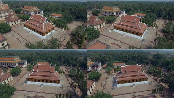 空中轨道拍摄的传统宝塔周围有佛教建筑。