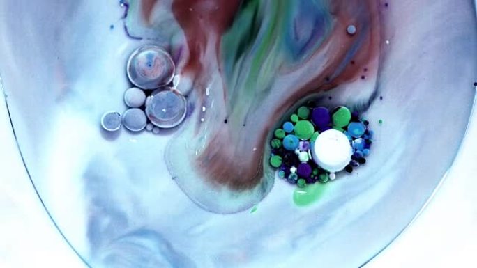 大理石图案的多色丙烯酸涂料。抽象的油漆和气泡。