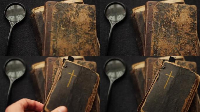 旧书、圣经和放大镜