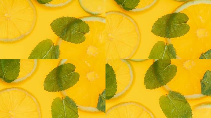 新鲜薄荷叶和橙片漂浮在柠檬水中的特写全高清视频