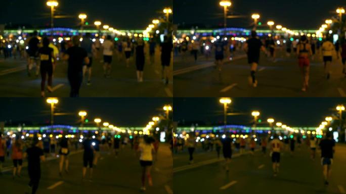 夜间城市跑步，带led灯的人群跑步，午夜跑步，每年夏季举行的短途马拉松比赛，无法识别的人