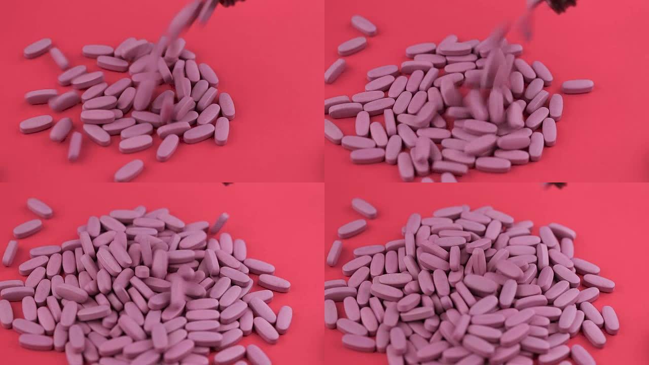 分散的粉红色药丸