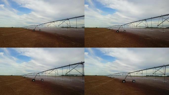 飞越枢轴农业灌溉用空中无人机拍摄。水系统田间灌溉