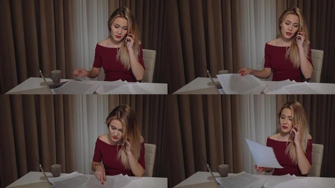 可爱的漂亮的年轻女商人打电话，在一家餐厅的笔记本电脑旁拆纸，喝杯咖啡