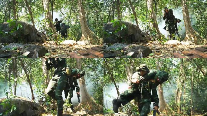 低角度视角:从热带森林搬运伤员的士兵