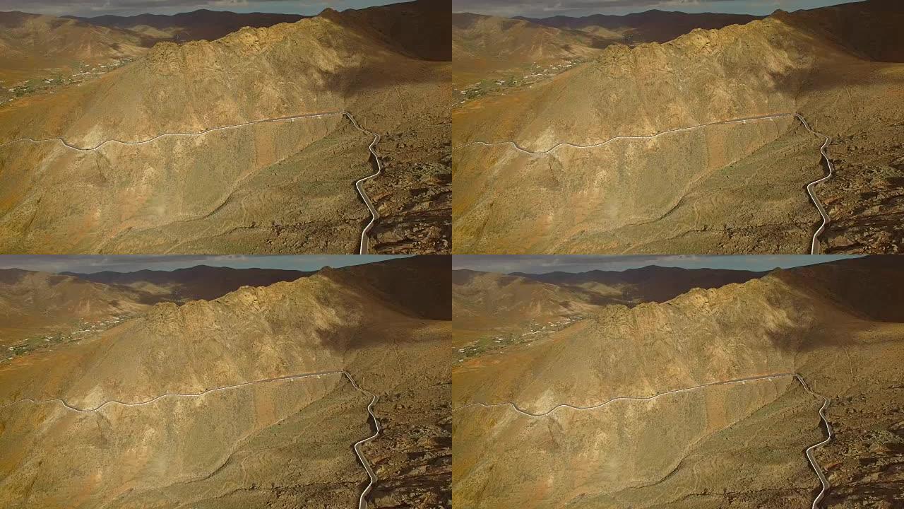 富埃特文图拉两个村庄之间蜿蜒的山路的鸟瞰图。
