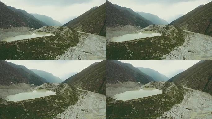 飞行无人机的空中射击美丽的高山湖泊和山峰